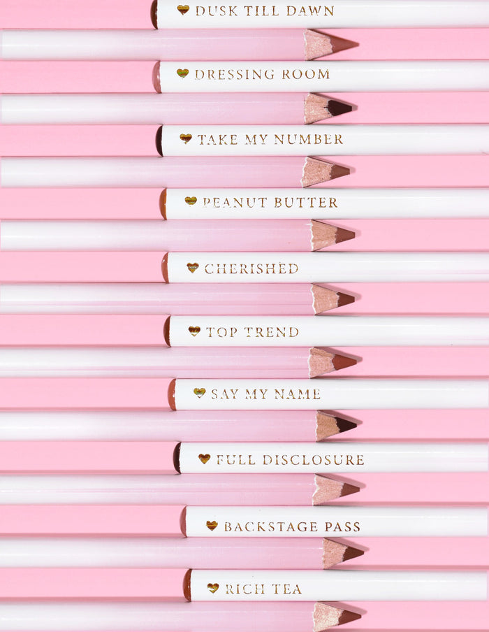 An image of the P.Louise Ultimate Definition Sharpenable Lip Liners in a row showing the bottoms and the name of each shades on the pencil